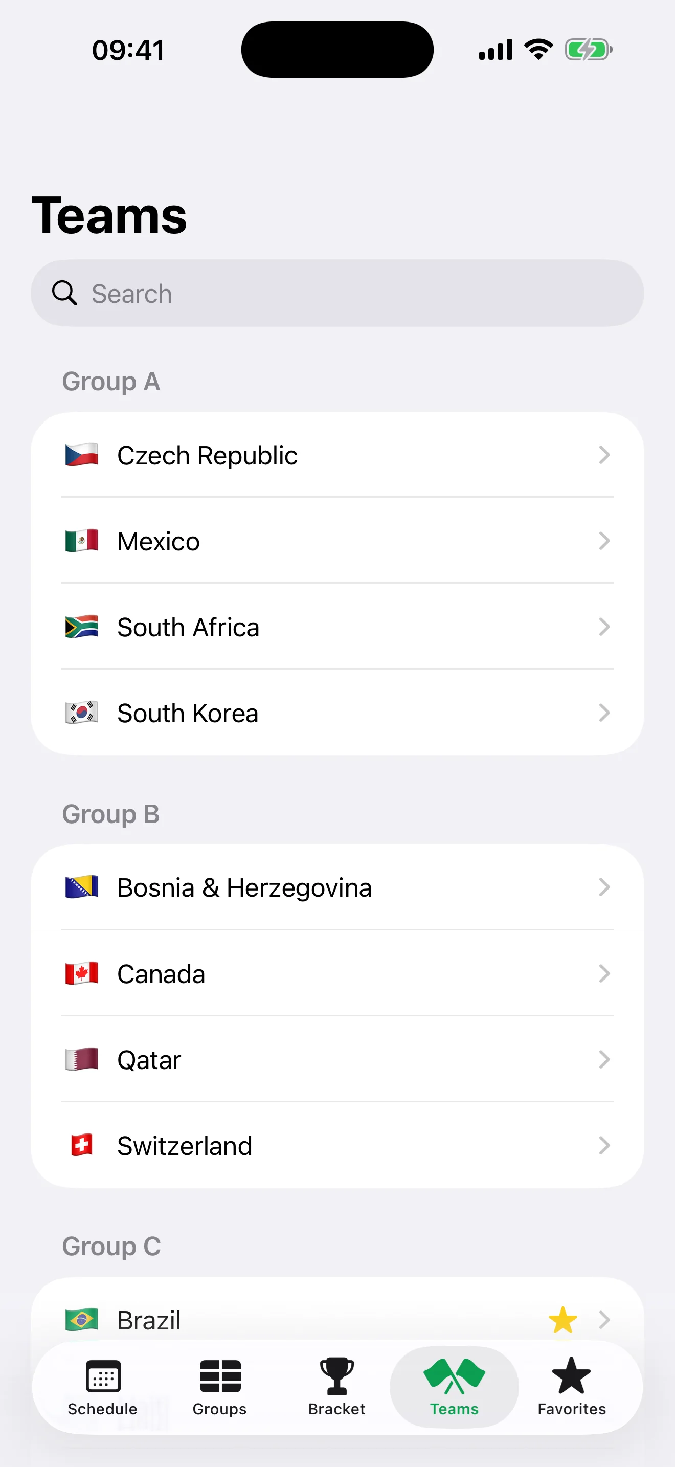 Teams list grouped by group with flags